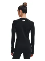 Remera térmica deportiva Under Armour modelo CG Authentics Crew, color negro, de manga larga con diseño raglán, cuello redondo y ajuste ceñido. Cuenta con el logo de la marca estampado en el pecho en color blanco.