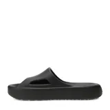Chanclas Puma modelo Shibui Cat, color negro, con diseño minimalista de una sola pieza, suela de plataforma y logo de la marca grabado en el lateral.