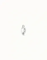 Dije de piercing dorado con forma circular y cristal celeste.