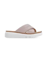 Sandalias Barths de cuero color nude, con capellada de tiras cruzadas acolchadas, suela anatómica y plataforma baja blanca.