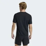 Remera deportiva Adidas de entrenamiento, color negro, con cuello redondo y mangas cortas. Presenta las icónicas tres rayas blancas de la marca en los laterales y el logo de Adidas en el pecho. Confeccionada en tejido técnico transpirable con tecnología Climacool.