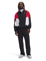 Campera deportiva Under Armour con cierre frontal parcial, diseño de bloques de color en negro, rojo y blanco, cuello alto y puños elásticos.
