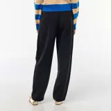 Pantalón de jogging negro de corte ancho y recto (barrel), tiro alto con elástico en la cintura.