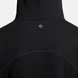 Hoodie negro de la colaboración Nike x Nocta, con logo Nike bordado en blanco en el pecho y diseño minimalista.