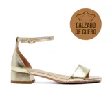 Sandalia de vestir Marco Donatti modelo Demi, color dorado, confeccionada en cuero con taco bloque bajo y tira ajustable al tobillo con hebilla metálica.