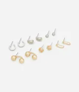 Set de seis pares de aros de metal con baño mixto dorado y plateado. Incluye aros tipo argolla, aros con forma orgánica, aros con forma de esfera, aros con forma de nudo y aros con forma geométrica.