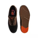Championes Vans modelo Skate Era con tecnología Wafflecup, combinando paneles de gamuza marrón y lona negra. Presenta suela negra con detalles en naranja en el talón y etiqueta lateral con el logo de la marca.