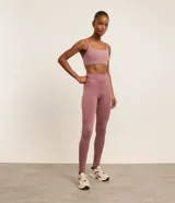Pantalón legging deportivo Get Over, color rosado, con diseño texturizado y sin costuras, de cintura alta y corte ajustado.