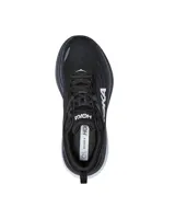 Championes de running Hoka One One Bondi 8, color negro con logo blanco en el lateral y suela gruesa en dos tonos.