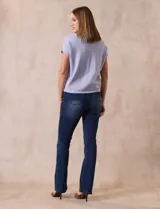 Buzo tejido color blanco, marca Ninety. Escote en V. Calado en escote y delantera.