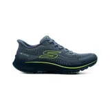 Championes deportivos Skechers Slip-ins Go Run Consistent 2.0 Lockhart, color azul con detalles en verde lima. Confeccionados con parte superior de tejido circular, amortiguación ULTRA LIGHT y tecnología Hands Free Slip-ins para un ajuste fácil sin manos.