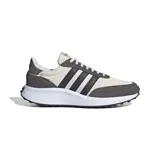 Championes Adidas Run 70s de estilo retro, con diseño inspirado en el running de los años 70. Presentan una combinación de colores beige y gris oscuro, con las icónicas tres franjas laterales en contraste, suela blanca gruesa y detalles en gamuza.