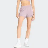 Short deportivo de mujer, color lila claro, modelo 2 en 1 con forro interior y cintura elástica.