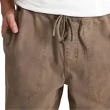 Pantalon de corte relajado con cintura elástica, confeccionado en tejido Bedford elástico con acabado teñido.