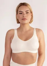 Soutien de microfibra sin costuras, con diseño de breteles anchos y banda elástica reforzada para mayor sujeción. Modelo sin aros ni copas preformadas.