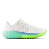 Championes New Balance Fresh Foam Evoz v2 para dama, color blanco con detalles en verde y celeste.