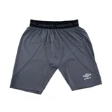 Calza deportiva térmica de hombre, color azul marino, con cintura elástica con logo Umbro repetido y logo Umbro estampado en la pierna derecha.