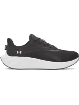 Championes de running Under Armour modelo W Ascend para mujer, de color negro con suela blanca. Cuentan con capellada de malla transpirable, amortiguación Charged+ y logo de la marca en el lateral y talón.