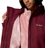 Campera 3 en 1 Columbia con sistema Interchange, compuesta por una capa exterior impermeable con tecnología Omni-Tech y una capa interior de forro polar con tecnología termorreflectante Omni-Heat. Presenta capucha desmontable, cierre frontal con solapa, bolsillos laterales con cremallera y puños ajustables.