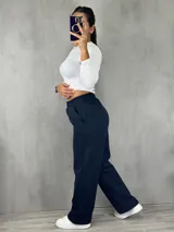 Pantalón de jogging gris melange, de corte amplio y cintura elástica.