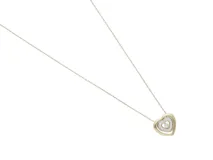 Collar de acero dorado con dije de corazón doble con circonias.