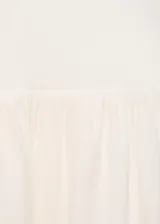 Vestido largo de diseño asimétrico con un solo hombro, confeccionado en tejido combinado con falda fluida y cuerpo ajustado.