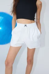 Boxer de popelín de algodón con cintura elástica ancha y logo doble R bordado en el frente.