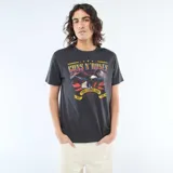 Camiseta de algodón color negro con estampado frontal de la banda Guns N' Roses, con diseño de águila y texto alusivo al tour Use Your Illusion de 1991.