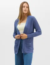 Cardigan abierto de tejido acanalado, con bolsillos frontales y mangas largas de corte entallado con puños de rib.