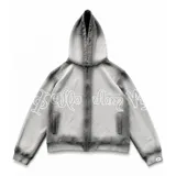 Buzo con capucha y cierre frontal, color gris con efecto lavado degradado. Presenta estampado gráfico en color blanco que recorre el pecho y las mangas, bolsillos laterales y etiqueta de marca en el puño.