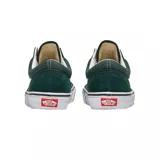 Championes de lona y gamuza Vans Old Skool de color verde oscuro, con la clásica banda lateral blanca Sidestripe, cordones blancos y suela de goma vulcanizada.