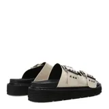 Sandalias de plataforma plana Miss Carol modelo Mavic, color negro, de estilo chunky con dos tiras anchas en el empeine decoradas con hebillas metálicas y ojales plateados.