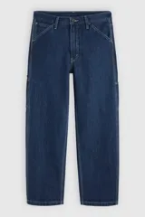 Jeans de denim azul oscuro con corte holgado y recto, estilo carpintero, con trabillas para cinturón y bolsillos funcionales.
