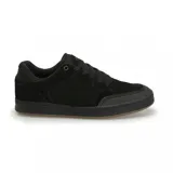 Championes de skate Emerica modelo Heretic, color negro con suela de goma en tono marrón. Presentan un diseño de perfil bajo con refuerzo en la puntera y paneles laterales de gamuza.