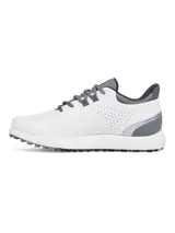 Championes de golf Under Armour modelo Drive Medal SL, color blanco con detalles en gris. Presentan parte superior de microfibra, mediasuela con tecnología Charged Cushioning para amortiguación y suela exterior sin tacos con tracción Rotational Resistance.
