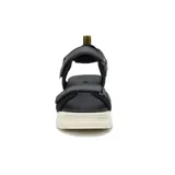 Sandalias Caterpillar modelo Second Chance para mujer, en color negro con suela gruesa track color marfil. Presentan tiras anchas con ajuste de velcro y detalles de la marca en amarillo.