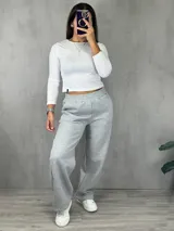Pantalón de jogging gris melange, de corte amplio y cintura elástica.
