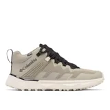 Championes de senderismo Columbia modelo Facet 75, color beige con detalles en negro. Diseño técnico con malla duradera, soporte de TPU en el mediopié y tecnología OutDry impermeable. Cuenta con suela Adapt Trax para mayor tracción y amortiguación TechLite Plush.