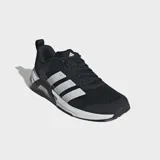 Championes de entrenamiento Adidas Dropset Control, color negro con las tres tiras características en blanco y detalles en la suela y talón. Confeccionados en malla transpirable, ideales para levantamiento de pesas y entrenamiento funcional.