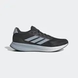 Championes de running Adidas Runfalcon 5, color negro con detalles en gris claro. Presentan una parte superior de malla transpirable, las tres franjas características de Adidas en gris claro, mediasuela Cloudfoam en gris claro y suela Adiwear blanca.