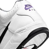 Championes de básquet Nike Air Flight Lite, color blanco con detalles en negro, violeta y naranja.