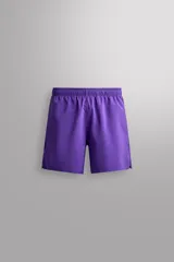 Pantalones cortos deportivos Zara Athleticz de tejido técnico ligero y elástico en color violeta, con cintura elástica, bolsillos frontales y aberturas laterales en el bajo.