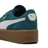 Championes Puma Palermo Elevated color verde con detalles en blanco y suela marrón.