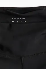 Leggings deportivos negros de corte amplio con tecnología SoftMove™ y DryMove™, de tiro alto y cintura ancha.