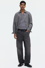 Musculosa gris oscuro de punto acanalado, confeccionada en mezcla de algodón, con cuello redondo y diseño ajustado slim fit.