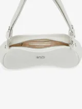 Bolso de hombro Diesel con diseño asimétrico inspirado en mandos de videojuegos. Presenta un acabado brillante, cierre superior con cremallera y detalle metálico esmaltado con el logo Oval D en el frente. Incluye correa ajustable.