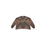 Remera manga larga de motocross en colaboración entre Travis Scott y Fox Racing, con diseño gráfico en tonos marrones, estampado de estrella grande y logo de zorro en el pecho.