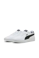 Championes Puma Court Classic Clean, color blanco con la icónica franja lateral de Puma en color negro. Diseño urbano con suela de goma y detalles de la marca en la lengüeta y el talón.