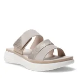Sandalias de plataforma con dos tiras anchas ajustables mediante velcro, con textura grabada en tonos beige y detalles metalizados.