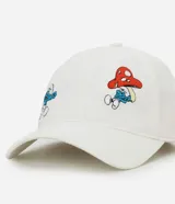 Gorra blanca de algodón con visera curva, estilo dad hat, con ajuste trasero de hebilla y bordados de personajes de Los Pitufos.